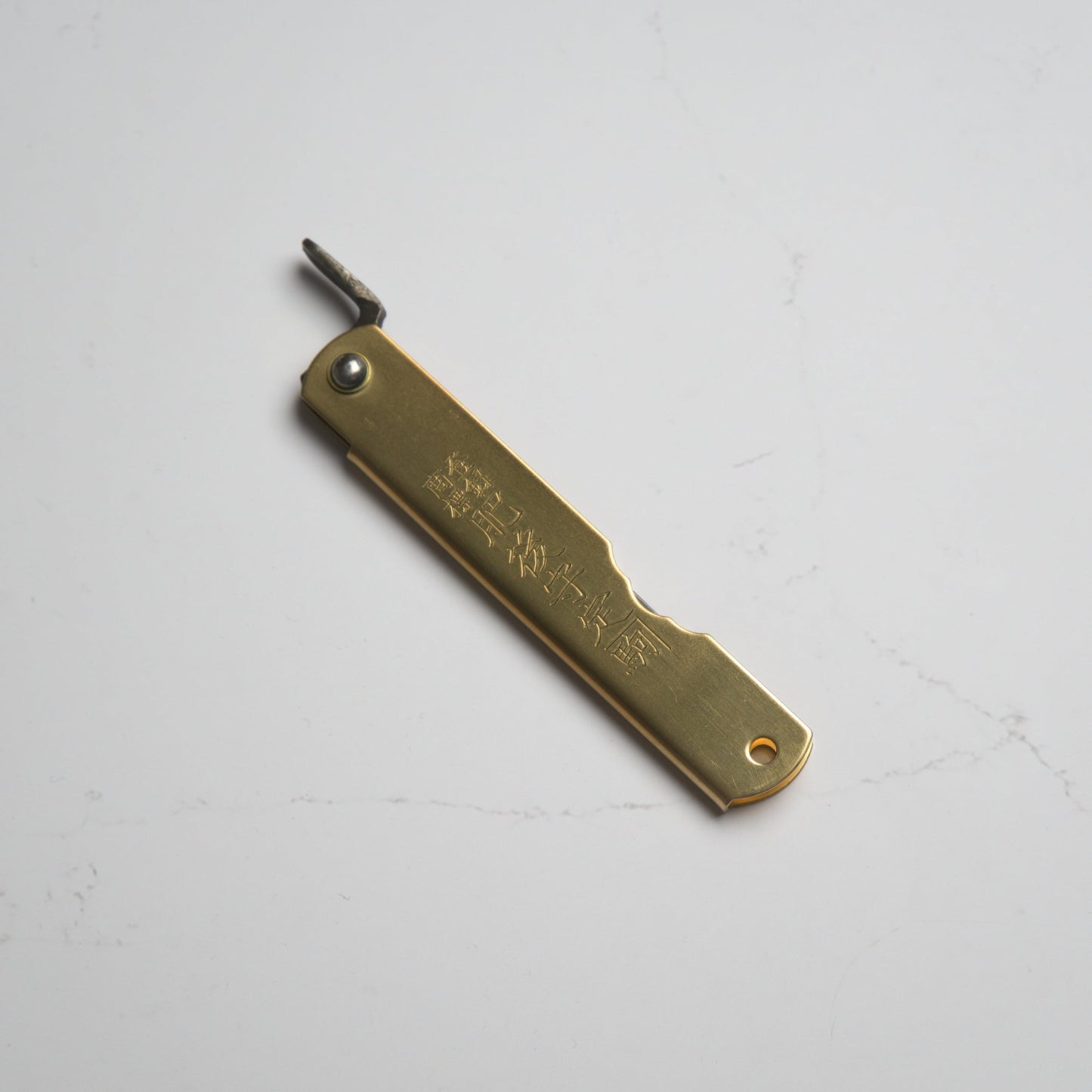 Nagao Kanekoma Higonokami Aogami Brass - Medium - Blade & Board