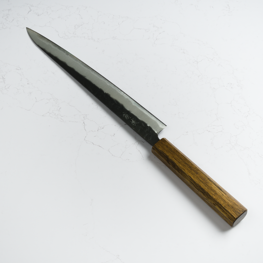 OUL Black Nashiji Aogami Super Sujihiki 270mm Japanese slicing knife with dark oak octagonal handle – handcrafted high-carbon steel knife for precision meat and fish slicing.
