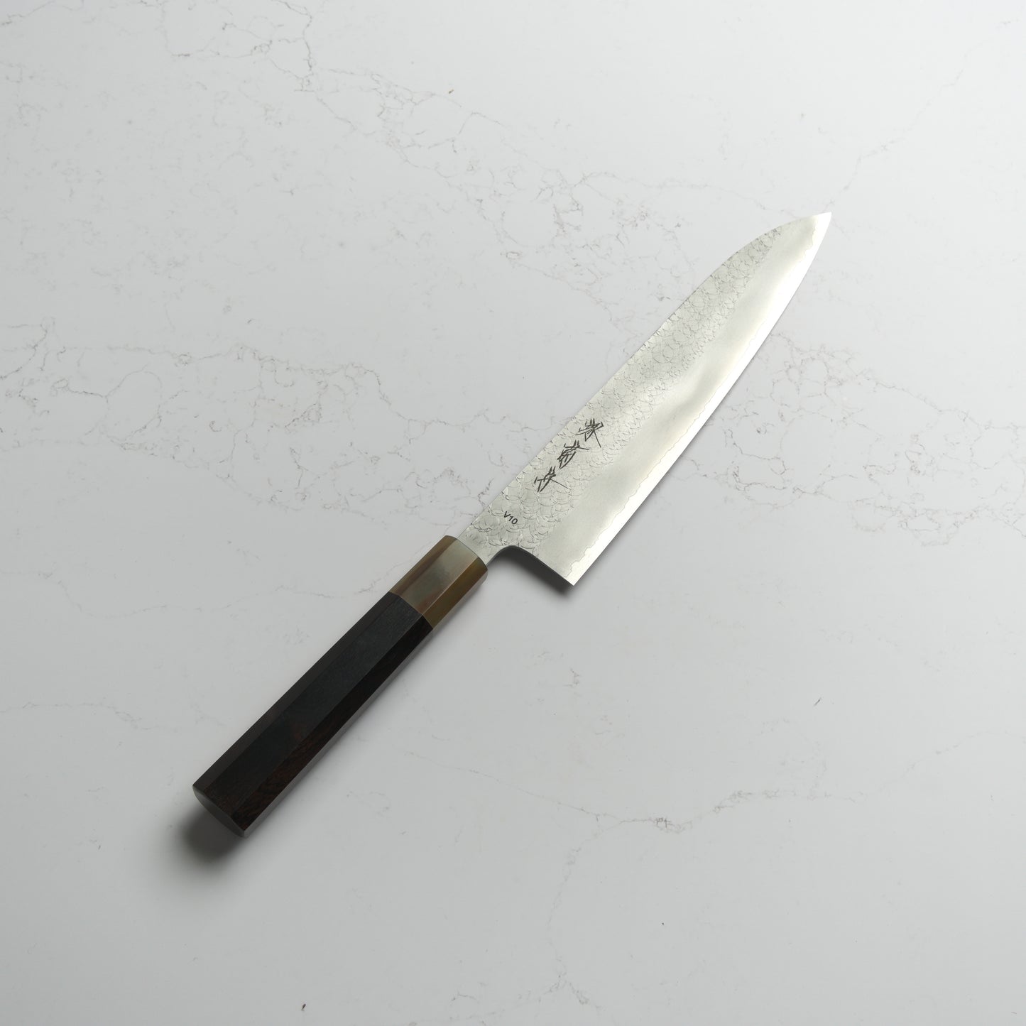 Sakai Kikumori VG10 Gyuto 210mm – Japanese chef’s knife made from VG10 stainless steel with a classic wa handle. Precision-crafted in Sakai, Japan. Available at Blade & Board.